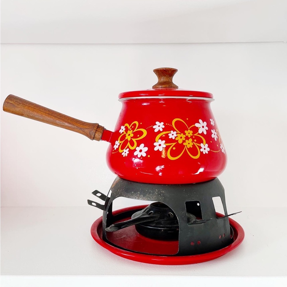 Vintage fondue pot circa 1970s with daisy motif